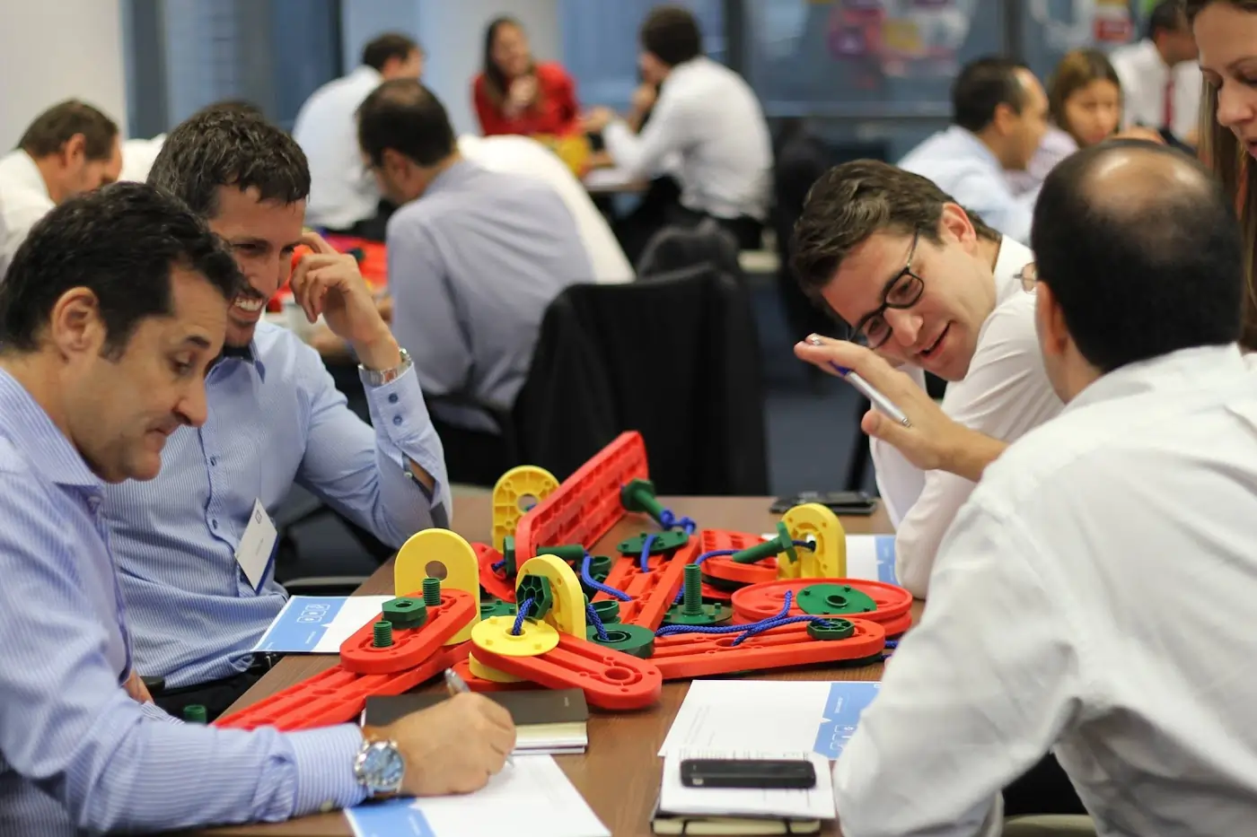 A group of staff interacting with an MTa Insights kit