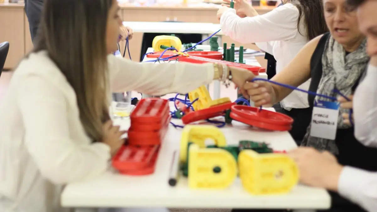 Participants using MTa Insights at a Masterclass, engaging in the 'Waste Away' leadership activity focused on leading through others.