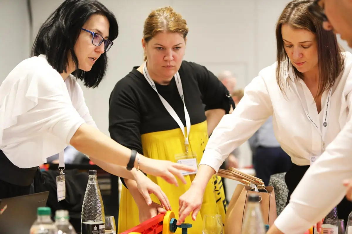Team of three interacting with an MTa Kit