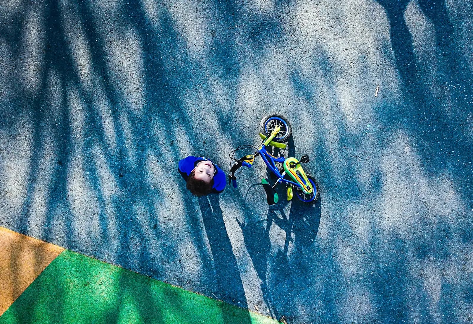 Child with bike staring up into sky - STEM activities for secondary school kids